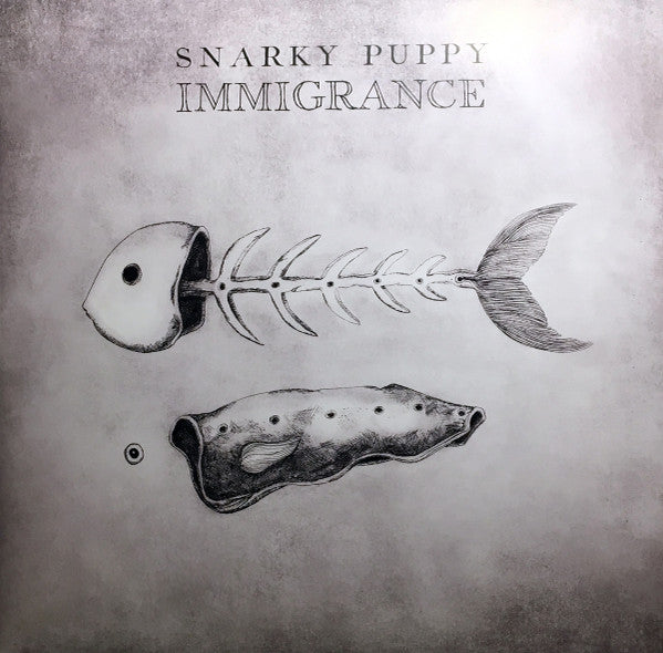 Snarky Puppy - Immigrance - The Funkadoobian